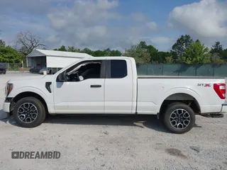 2023 Ford F-150 XL with VIN 1FTEX1CP9PKF91606, listed as a IAAI auction lot 42124058 with 23,535 mi miles and . Bid and sale history available at DreamBid. Image 14.
