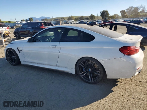 2015 BMW M4 with VIN WBS3R9C59FK334290, listed as a Copart auction lot 87755955 with 59,403 mi miles and Salvage Title. Bid and sale history available at carsss.com. Image 2.