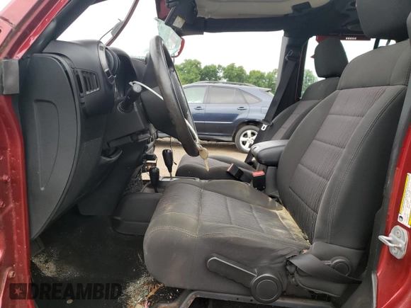 2012 Jeep Wrangler Unlimited Sport with VIN 1C4BJWDG6CL234419, listed as a Copart auction lot 62284825 with 66,649 mi miles and Salvage title. Bid and sale history available at DreamBid. Image 7.