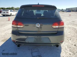 2013 Volkswagen GTI with VIN WVWFV7AJ1DW106097, listed as a Copart auction lot 49398835 with 138,378 mi miles and Salvage Title. Bid and sale history available at carsss.com. Image 6.
