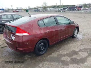 2011 Honda Insight with VIN JHMZE2H37BS011148, listed as a IAAI auction lot 41953167 with 79,143 mi miles and . Bid and sale history available at DreamBid. Image 4.