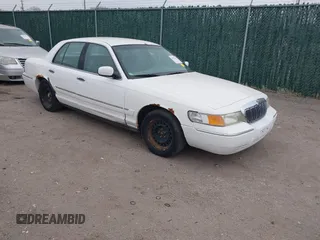 2000 Mercury Grand Marquis GS z VIN 2MEFM74W0YX629579, wystawiony jako IAAI lot #41827296 z przebiegiem 257 534 mil mil oraz . Historia ofert i sprzedaży dostępna na DreamBid. Obrazek 1.