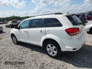 2012 Dodge Journey SXT with VIN 3C4PDCBG7CT189106, listed as a Copart auction lot 64659075 with 187,170 mi miles and Clean title. Bid and sale history available at DreamBid. Image 2.