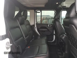 2018 Jeep Wrangler Unlimited Rubicon z VIN 1C4HJXFGXJW258554, wystawiony jako Copart lot #55863905 z przebiegiem 60 492 mil mil oraz Szkoda całkowita • Salvage title. Historia ofert i sprzedaży dostępna na DreamBid. Obrazek 10.