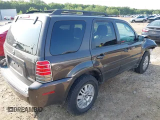 2006 Mercury Mariner Luxury with VIN 4M2YU56196KJ20438, listed as a IAAI auction lot 42394996 with 164,564 mi miles and . Bid and sale history available at DreamBid. Image 4.