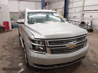 2016 Chevrolet Tahoe LTZ with VIN 1GNSKCKCXGR284827, listed as a IAAI auction lot 41389540 with 93,150 mi miles. Bid and sale history available at carsss.com. Image 1.