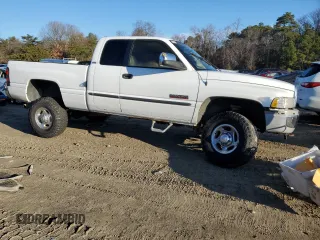 2000 Dodge Ram 2500 with VIN 1B7KF2365YJ134172, listed as a Copart auction lot 86485314 with 237,115 mi miles and Salvage Title. Bid and sale history available at carsss.com. Image 4.