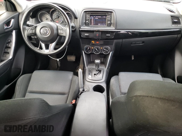 2014 Mazda CX-5 Sport with VIN JM3KE2BE9E0372370, listed as a Copart auction lot 58980165 with 175,477 mi miles and Salvage title. Bid and sale history available at DreamBid. Image 8.