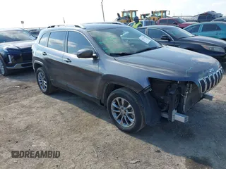 2020 Jeep Cherokee Altitude with VIN 1C4PJLLB5LD580742, listed as a IAAI auction lot 41483128 with 77,127 mi miles. Bid and sale history available at carsss.com. Image 1.