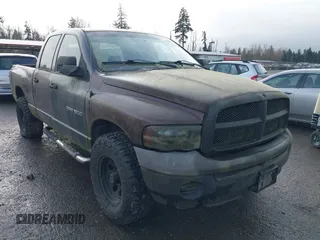 2004 Dodge 1500 SLT with VIN 1D7HU18D34S667939, listed as a IAAI auction lot 41848125 with 175,094 mi miles. Bid and sale history available at carsss.com. Image 1.