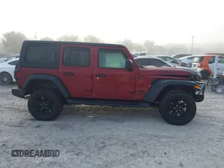 2021 Jeep Wrangler Unlimited Willys with VIN 1C4HJXDN6MW815448, listed as a IAAI auction lot 41459304 with 52,474 mi miles and . Bid and sale history available at DreamBid. Image 13.