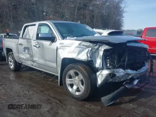 2018 Chevrolet Silverado 1500 LTZ with VIN 3GCUKSECXJG536316, listed as a IAAI auction lot 41432469 with 127,276 mi miles. Bid and sale history available at carsss.com. Image 1.