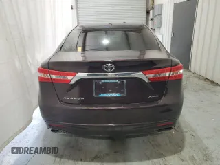 2014 Toyota Avalon Limited z VIN 4T1BK1EB6EU077986, wystawiony jako Copart lot #54209645 z przebiegiem 121 685 mil mil oraz Czysty tytuł • Clean title. Historia ofert i sprzedaży dostępna na DreamBid. Obrazek 6.