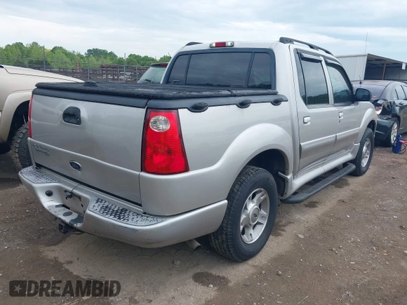 2004 Ford Explorer Sport Trac XLS z VIN 1FMDU77K74UA77223, wystawiony jako IAAI lot #42167996 z przebiegiem Nie podano mil oraz . Historia ofert i sprzedaży dostępna na DreamBid. Obrazek 4.