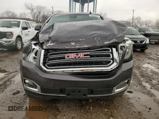 2015 GMC Yukon SLT with VIN 1GKS2BKC1FR732961, listed as a Copart auction lot 49898945 with 0 mi miles and Salvage Title. Bid and sale history available at carsss.com. Image 5.