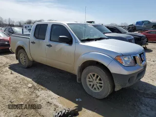 2015 Nissan Frontier Pro-4X with VIN 1N6AD0EV1FN701118, listed as a Copart auction lot 53055055 with 225,081 mi miles and Salvage title. Bid and sale history available at DreamBid. Image 4.