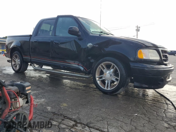 2001 Ford F-150 XLT with VIN 1FTRW07L51KA31353, listed as a Copart auction lot 59724275 with Not provided miles and Salvage title. Bid and sale history available at DreamBid. Image 4.