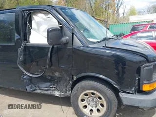 2012 Chevrolet Express Cargo Van with VIN 1GCSGAFX1C1202181, listed as a IAAI auction lot 42050001 with 167,854 mi miles. Bid and sale history available at carsss.com. Image 6.