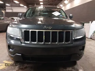 2011 Jeep Grand Cherokee 70th Anniversary with VIN 1J4RR4GG3BC566690, listed as a IAAI auction lot 41810545 with 173,886 mi miles. Bid and sale history available at carsss.com. Image 12.