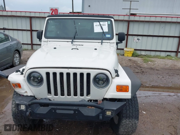 2003 Jeep Wrangler Sport with VIN 1J4FA49S43P362339, listed as a IAAI auction lot 41452901 with 208,128 mi miles and . Bid and sale history available at DreamBid. Image 13.