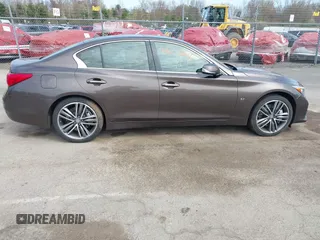 2014 Infiniti Q50 Premium z VIN JN1BV7AR0EM687810, wystawiony jako IAAI lot #42073610 z przebiegiem 167 912 mil mil oraz . Historia ofert i sprzedaży dostępna na DreamBid. Obrazek 13.