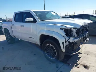 2024 Toyota Tacoma 2WD SR5 with VIN 3TMKB5FN1RM003096, listed as a IAAI auction lot 41440928 with 14,726 mi miles. Bid and sale history available at carsss.com. Image 1.