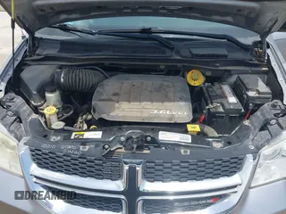 2015 Dodge Grand Caravan American Value with VIN 2C4RDGBGXFR542672, listed as a IAAI auction lot 42230608 with 102,753 mi miles and . Bid and sale history available at DreamBid. Image 10.