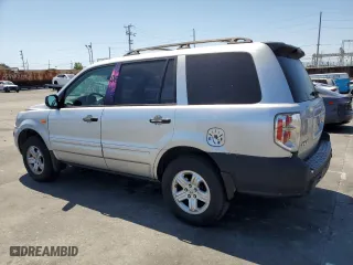 2007 Honda Pilot LX with VIN 5FNYF281X7B012081, listed as a Copart auction lot 52637735 with 142,729 mi miles and Salvage Title. Bid and sale history available at carsss.com. Image 2.