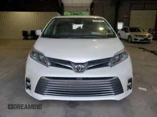 2018 Toyota Sienna XLE with VIN 5TDDZ3DC9JS204307, listed as a Copart auction lot 57327715 with 70,886 mi miles and Salvage title. Bid and sale history available at DreamBid. Image 5.