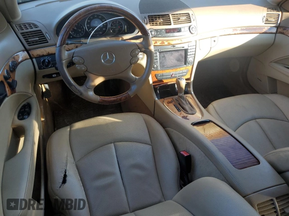2009 Mercedes-Benz E 350 with VIN WDBUH87X29B445142, listed as a Copart auction lot 41765205 with 212,211 mi miles and Salvage Title. Bid and sale history available at DreamBid. Image 8.