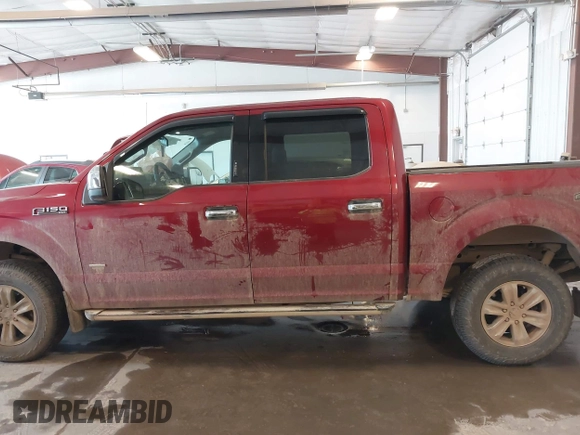 2015 Ford F-150 XLT with VIN 1FTEW1EG8FFA41398, listed as a IAAI auction lot 42102711 with 129,812 mi miles and . Bid and sale history available at DreamBid. Image 14.