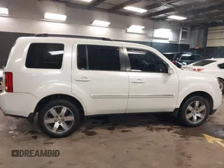 2015 Honda Pilot Touring with VIN 5FNYF4H98FB001841, listed as a IAAI auction lot 41955645 with 109,818 mi miles. Bid and sale history available at carsss.com. Image 13.