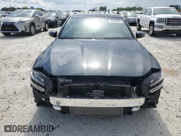 2023 Genesis G70 2.0T with VIN KMTG34TA4PU120566, listed as a Copart auction lot 53307455 with 31,933 mi miles and Salvage title. Bid and sale history available at DreamBid. Image 5.