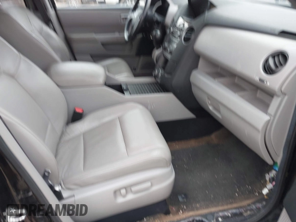 2013 Honda Pilot Touring z VIN 5FNYF4H92DB026943, wystawiony jako IAAI lot #41844735 z przebiegiem 196 406 mil mil oraz . Historia ofert i sprzedaży dostępna na DreamBid. Obrazek 5.