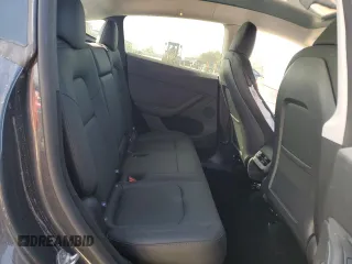 2025 Tesla Model Y Long Range z VIN 7SAYGDEE8SA338745, wystawiony jako Copart lot #50034495 z przebiegiem 4 829 mil mil oraz Szkoda całkowita • Salvage title. Historia ofert i sprzedaży dostępna na DreamBid. Obrazek 11.