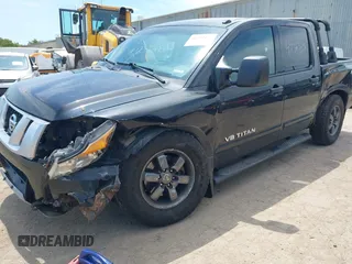 2013 Nissan Titan SV with VIN 1N6AA0EC4DN302479, listed as a IAAI auction lot 42383255 with 112,991 mi miles and . Bid and sale history available at DreamBid. Image 6.