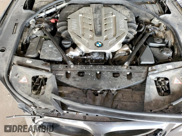 2011 BMW 7 Series 750Li z VIN WBAKB8C58BC852166, wystawiony jako Copart lot #51004065 z przebiegiem 110 499 mil mil oraz Szkoda całkowita • Salvage title. Historia ofert i sprzedaży dostępna na DreamBid. Obrazek 11.