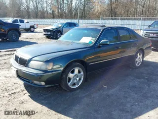 2000 Infiniti Q45 with VIN JNKBY31A7YM301457, listed as a IAAI auction lot 41583825 with 174,265 mi miles. Bid and sale history available at carsss.com. Image 2.