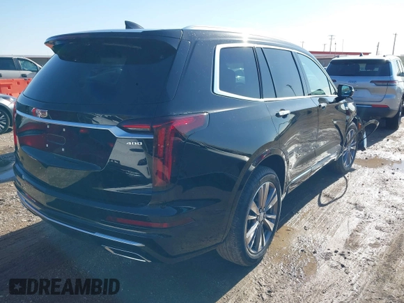 2025 Cadillac XT6 FWD Premium Luxury with VIN 1GYKPCRS1SZ118772, listed as a IAAI auction lot 41048190 with 131 mi miles. Bid and sale history available at carsss.com. Image 4.