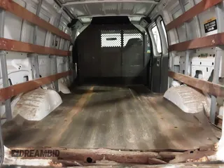 2006 Ford Econoline Cargo with VIN 1FTNE24W56DA13331, listed as a IAAI auction lot 41822424 with 370,496 mi miles and . Bid and sale history available at DreamBid. Image 18.