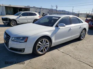 2015 Audi A8 with VIN WAUJGAFD3FN030568, listed as a Copart auction lot 75785923 with 83,911 mi miles and . Bid and sale history available at DreamBid. Image 1.