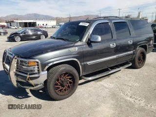 2004 GMC Yukon XL SLE with VIN 3GKEC16T04G143220, listed as a Copart auction lot 77038464 with 139,060 mi miles and Salvage Title. Bid and sale history available at carsss.com. Image 1.
