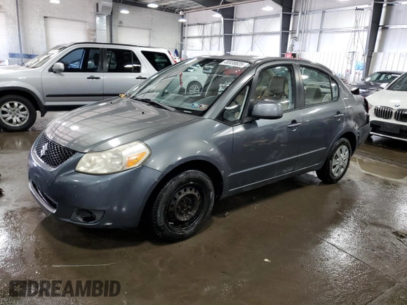 2009 Suzuki SX4 Man FWD with VIN JS2YC412496200218, listed as a Copart auction lot 46938825 with 63,909 mi miles and Salvage Title. Bid and sale history available at carsss.com. Image 1.