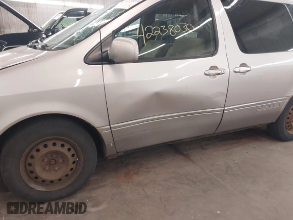 2001 Toyota Sienna LE z VIN 4T3ZF13C31U324428, wystawiony jako IAAI lot #42238030 z przebiegiem 209 762 mil mil oraz . Historia ofert i sprzedaży dostępna na DreamBid. Obrazek 6.