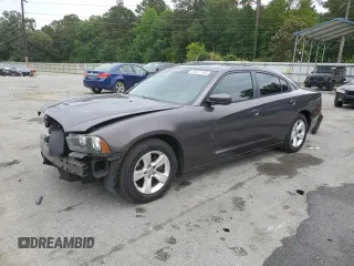 2014 Dodge Charger SXT z VIN 2C3CDXHGXEH261414, wystawiony jako Copart lot #55871705 z przebiegiem 221 000 mil mil oraz Szkoda całkowita • Salvage title. Historia ofert i sprzedaży dostępna na DreamBid. Obrazek 1.