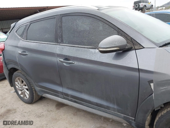 2017 Hyundai Tucson Value with VIN KM8J33A22HU358357, listed as a IAAI auction lot 41583774 with 139,338 mi miles. Bid and sale history available at carsss.com. Image 14.