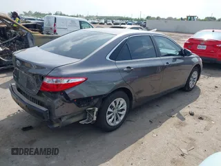 2016 Toyota Camry XLE with VIN 4T4BF1FKXGR521530, listed as a IAAI auction lot 41900074 with 151,251 mi miles and . Bid and sale history available at DreamBid. Image 4.