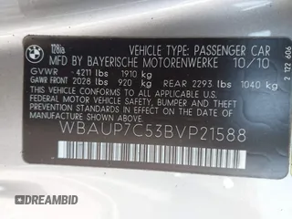 2011 BMW 1 Series 128i with VIN WBAUP7C53BVP21588, listed as a IAAI auction lot 41484300 with 52,124 mi miles. Bid and sale history available at carsss.com. Image 9.