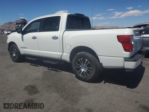 2021 Nissan Titan Pro-4X z VIN 1N6AA1ED5MN501877, wystawiony jako Copart lot #63714005 z przebiegiem 21 821 mil mil oraz Szkoda całkowita • Salvage title. Historia ofert i sprzedaży dostępna na DreamBid. Obrazek 2.