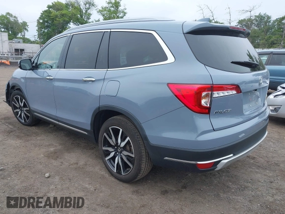 2022 Honda Pilot Touring 7-Passenger with VIN 5FNYF6H68NB056077, listed as a IAAI auction lot 42357338 with 18,193 mi miles and . Bid and sale history available at DreamBid. Image 3.